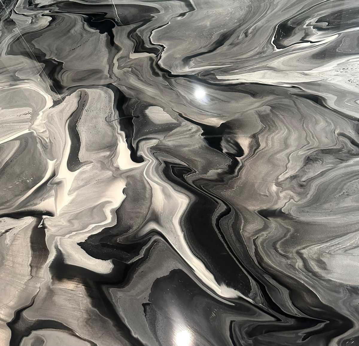 Black, gray and white marble epoxy floor